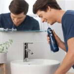 Irigator bucal portabil Waterpik WP-583, Albastru - imagine 2
