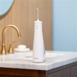Irigator bucal portabil Waterpik WF-26 – Alb — изображение 3